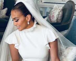 Jennifer López usa vetidos de novia exclusivos del diseñador Ralph Lauren.(Foto: Cortesía de OntheJLo.com)